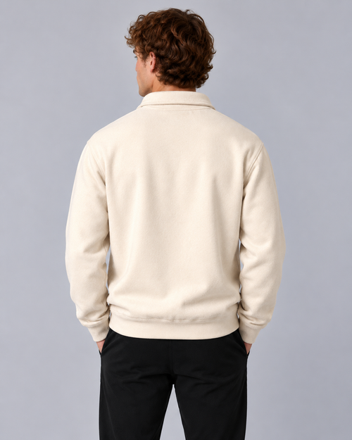 Male model wearing Ten Toes Down Cream Standard Quarter Zip, back view
